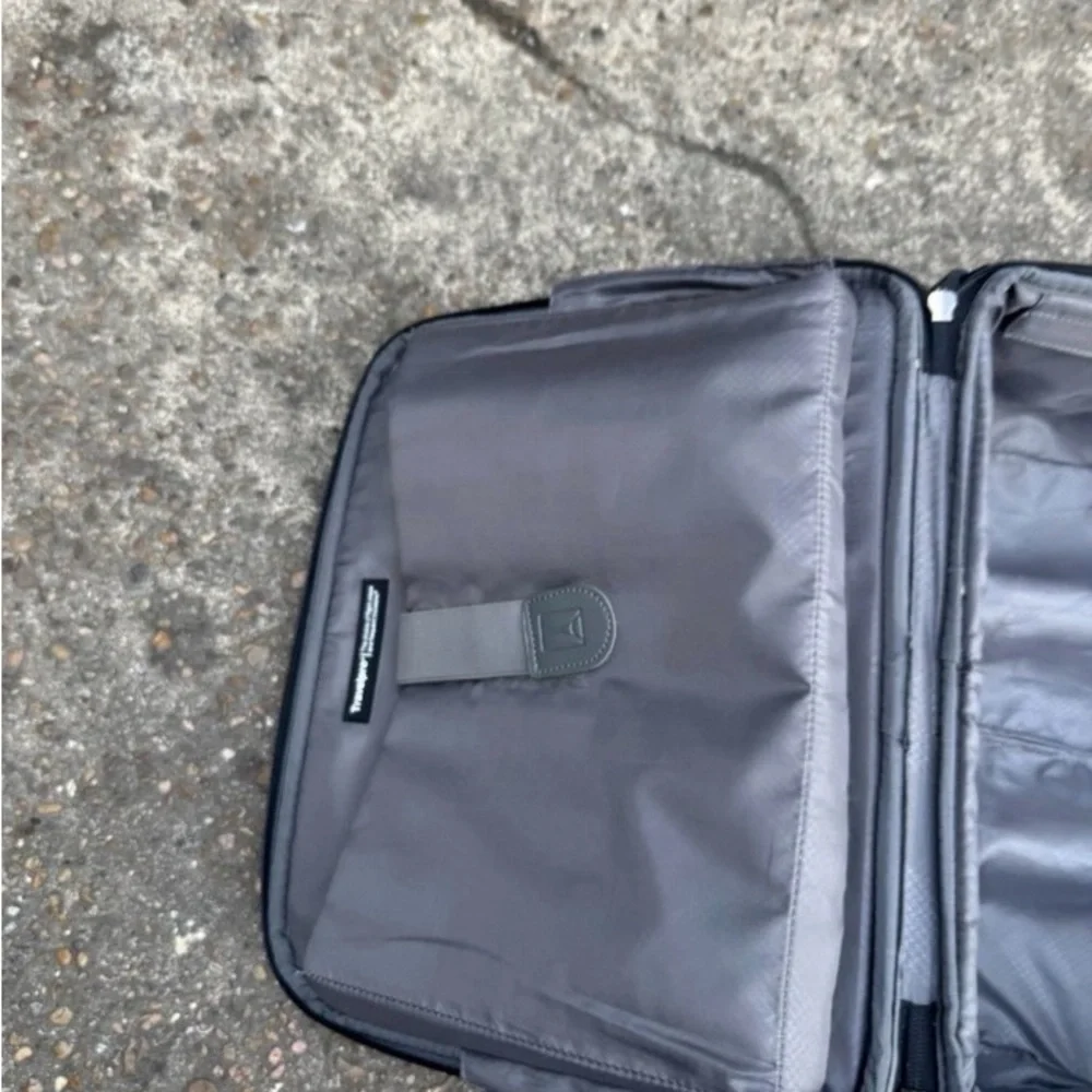 Travelpro Black Soft-Shell Rolling Under-seat Carry-On with Front Pocket